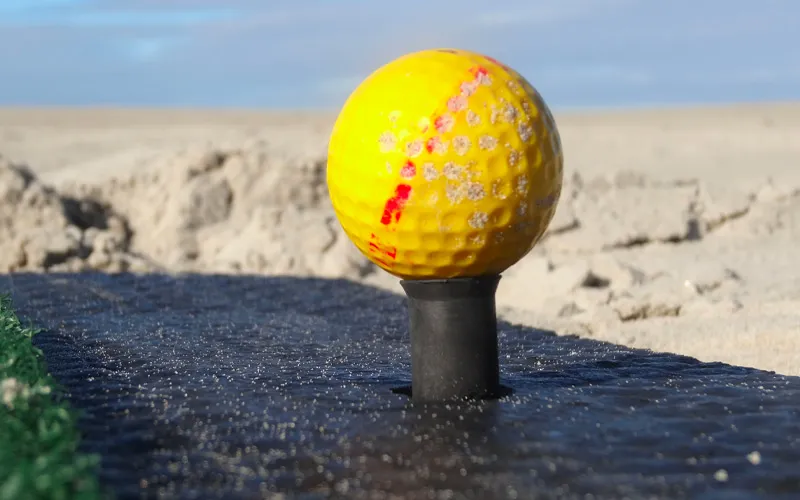 Golfclinic op het strand